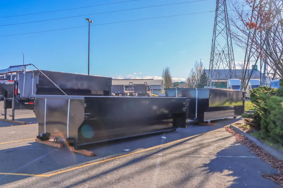 Roll-off dumpster ready for waste disposal at job site for 15 Yard Dumpster Rental in Mission
